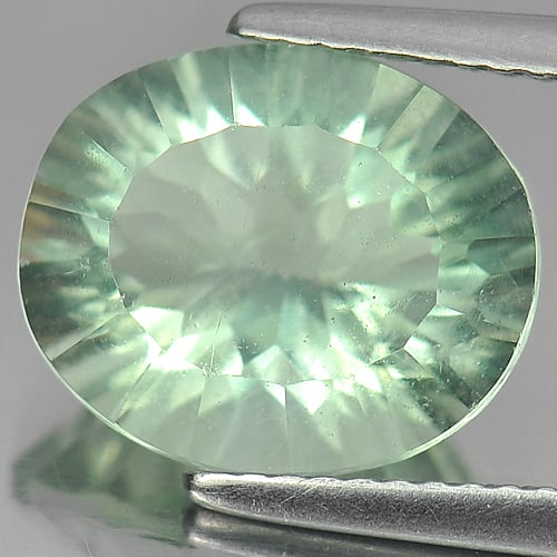 Natural Green Fluorite Gemstones 5.33 Ct. Oval Concave Cut 12.1 x 10.2 Mm: Product ID: 802704959 Product Name: Natural Fluorite Weight: 5.33 CT. Size: 12.1 x 10.2 x 6.9 MM. Shape: Oval Concave Cut Color: Green Clarity:VSI Luster: Good Gems Origin: Brazil Treatment: Unheated 
