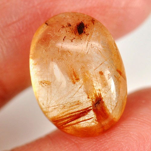 Natural White Brown Rutilated Quartz Gemstones 8.09 Ct. Oval Cabochon Shape 15.3 x 11.4 Mm.: Product ID: 805524701 Product Name: Natural Quartz Weight: 8.09 CT. Size: 15.3 x 11.4 x 6.3 MM. Shape: Oval Cabochon Color: White Brown Clarity:Semi - Transparent Luster: Good Gems Origin: Thailand Tr