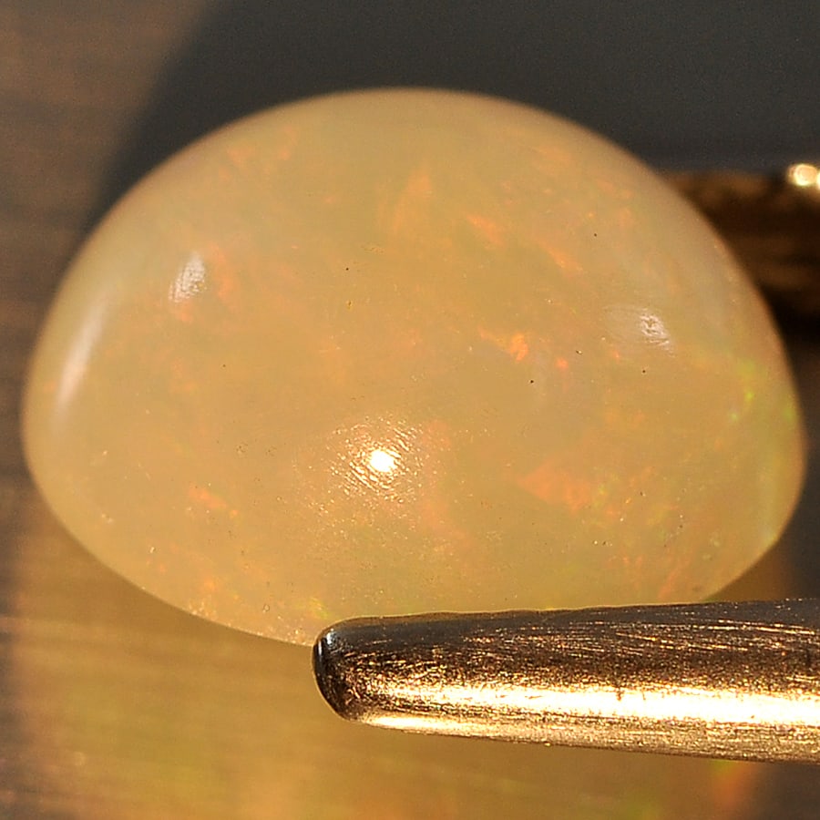 Natural Multi Color Opal Gemstones 1.30 Ct. Oval Cabochon Shape 8.5 x 7.3 Mm.: Product ID: 818713288 Product Name: Natural Opal Weight: 1.30 CT. Size: 8.5 x 7.3 x 4.6 MM. Shape: Oval Cabochon Color: Multi Color Clarity:Semi - Transparent Luster: Good Gems Origin: Ethiopia Treatm
