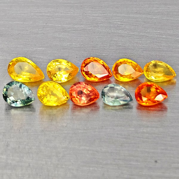 Natural Multi Color Sapphire Gemstones 1.81 Ct. 10 Pcs. Pear Shape And Mixed Size: Product ID: 806162734 Product Name: Natural Fancy Color Sapphire Weight: 1.81 CT. Size: 4.7 x 3.2 x 1.8 to 4 x 3 x 1.8 MM. Shape: Pear Shape Color: Multi Color Clarity:VVS Luster: Very Good Gems Origi