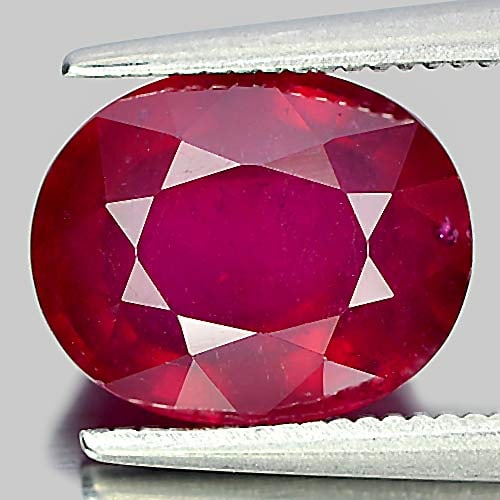 Natural Purplish Red Ruby Gemstones 4.03 Ct. Oval Shape 10 x 8.1 Mm.: Product ID: 805933800 Product Name: Natural Ruby Weight: 4.03 CT. Size: 10 x 8.1 x 5.5 MM. Shape: Oval Color: Red Clarity:VSI Luster: Good Gems Origin: Mozambique Treatment: Heated Lead-glass filling 