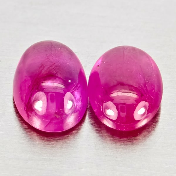 Natural Pink Red Jonson Ruby Gemstones 1.28 Ct. 2 Pcs. Oval Cabochon Shape 6.1 x 4.1 Mm.: Product ID: 805935732 Product Name: Natural Ruby Weight: 1.28 CT. Size: 6.1 x 4.1 x 2.4 MM. Shape: Oval Cabochon Color: Pink Red Clarity:Semi - Transparent Luster: Good Gems Origin: Mozambique Treatme