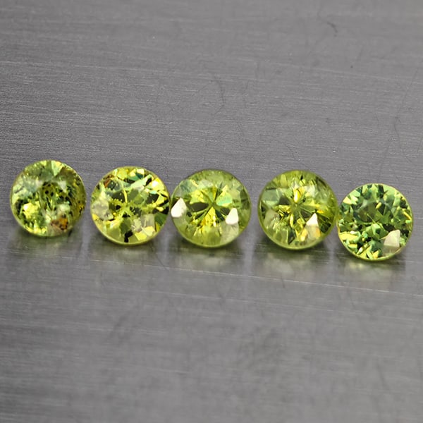 Natural Green Demantiod Garnet Gemstones 0.80 Ct. 5 Pcs. Round Diamond Cut 3.3 Mm.: Product ID: 802937689 Product Name: Natural Demantoid Weight: 0.80 CT. Size: 3.3 x 3.3 x 2.5 MM. Shape: Round Diamond Cut Color: Green Clarity:SI1 Luster: Good Gems Origin: Madagascar Treatment: Unhea