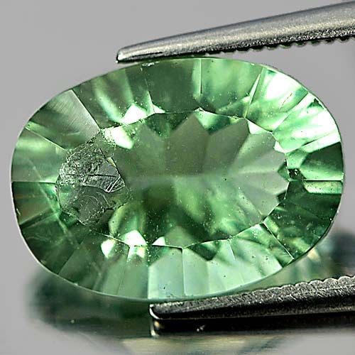Natural Bluish Green Fluorite Gemstones 6.87 Ct. Oval Concave Cut 13.9 x 10.1 Mm.: Product ID: 802704514 Product Name: Natural Fluorite Weight: 6.87 CT. Size: 13.9 x 10.1 x 7.1 MM. Shape: Oval Concave Cut Color: Bluish Green Clarity:VSI Luster: Good Gems Origin: Brazil Treatment: Un