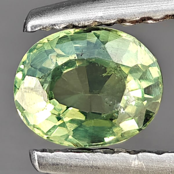 Natural Green Songea Sapphire Gemstones 0.56 Ct. Oval Shape 5.2 x 4.2 Mm.: Product ID: 806163006 Product Name: Natural Green Sapphire Weight: 0.56 CT. Size: 5.2 x 4.2 x 2.8 MM. Shape: Oval Shape Color: Green Clarity:VSI Luster: Good Gems Origin: Tanzania Treatment: Heated Cr