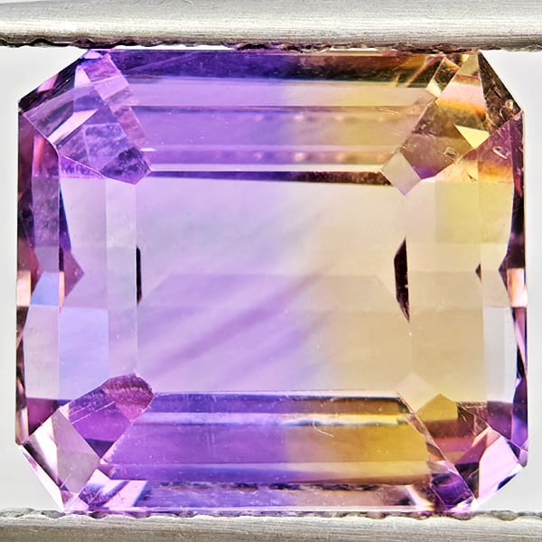 Natural Bi Color Ametrine Gemstones 3.83 Ct. Octagon Shape 9.7 x 8.7 Mm.: Product ID: 800408620 Product Name: Natural Ametrine Weight: 3.83 CT. Size: 9.7 x 8.7 x 5.8 MM. Shape: Octagon Color: Bi Color Clarity:VVS Luster: Good Gems Origin: Bolivia Treatment: Unheated Crystal