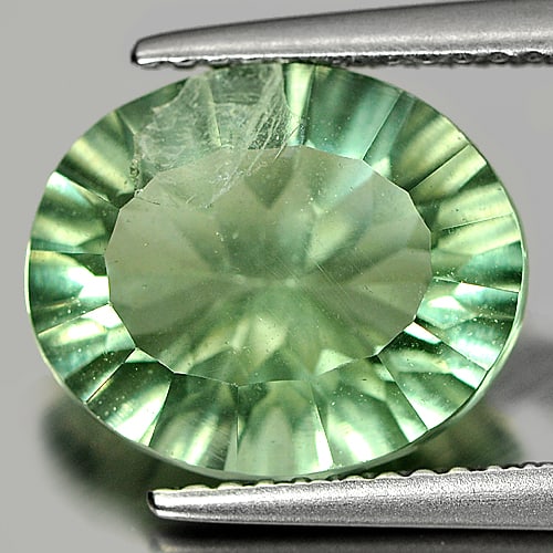 Natural Green Fluorite Gemstones 4.28 Ct. Oval Concave Cut 12.2 x 10.2 Mm.: Product ID: 802705459 Product Name: Natural Fluorite Weight: 4.28 CT. Size: 12.2 x 10.2 x 5 MM. Shape: Oval Concave Cut Color: Green Clarity:SI1 Luster: Good Gems Origin: Brazil Treatment: Unheated Cr