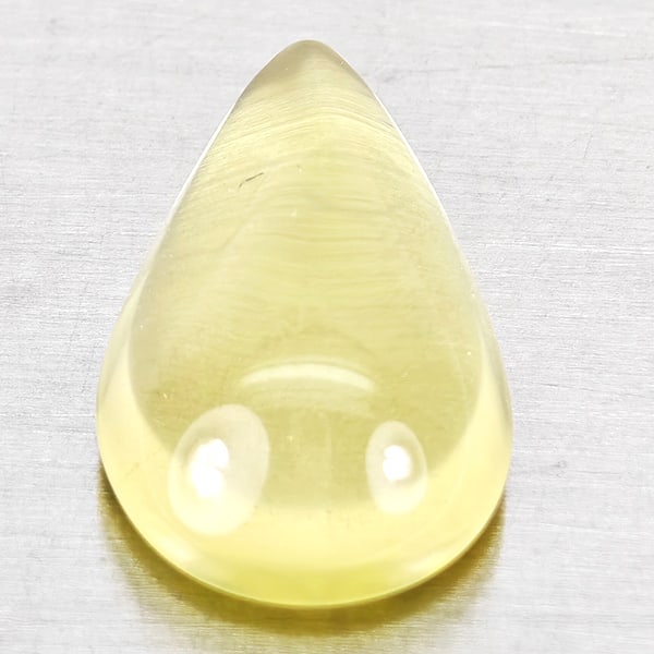 Natural Yellow Lemon Quartz Gemstones 5.19 Ct. Pear Cabochon Shape 16 x 9.8 Mm.: Product ID: 805530094 Product Name: Natural Quartz Weight: 5.19 CT. Size: 16 x 9.8 x 5.8 MM. Shape: Pear Cabochon Color: Yellow Lemon Clarity:None Luster: Good Gems Origin: Brazil Treatment: Unheated 