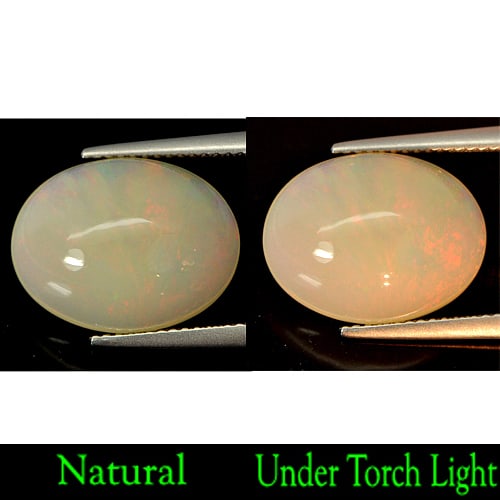 Natural Multi-Color Flashing Play Of Colour Opal Gemstones 6.09 Ct. Oval Cabochon Shape 16.2 x 12.5: Product ID: 818717020 Product Name: Natural Opal Weight: 6.09 CT. Size: 16.2 x 12.5 x 6.9 MM. Shape: Oval Cabochon Color: Multi Color Clarity:Semi - Transparent Luster: Iridescent Gems Origin: Ethiopi