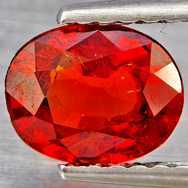 Natural Orangish Red Spessartine Garnet Gemstones 1.13 Ct. Oval Shape 7 x 5.5 Mm.: Product ID: 802937186 Product Name: Natural Garnet Weight: 1.13 CT. Size: 7 x 5.5 x 3.1 MM. Shape: Oval Shape Color: Orangish Red Clarity:SI1 Luster: Good Gems Origin: Namibia Treatment: Unheated Crys