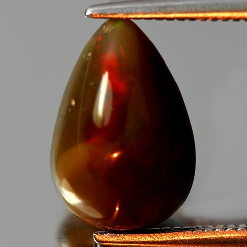 Natural Multi Color Opal Gemstones 2.35 Ct. Pear Cabochon Shape 12 x 8 Mm.: Product ID: 818709333 Product Name: Natural Opal Weight: 2.35 CT. Size: 12 x 8 x 5.6 MM. Shape: Pear Cabochon Color: Multi Color Clarity:Opaque Luster: Iridescent Gems Origin: Ethiopia Treatment: Unhe