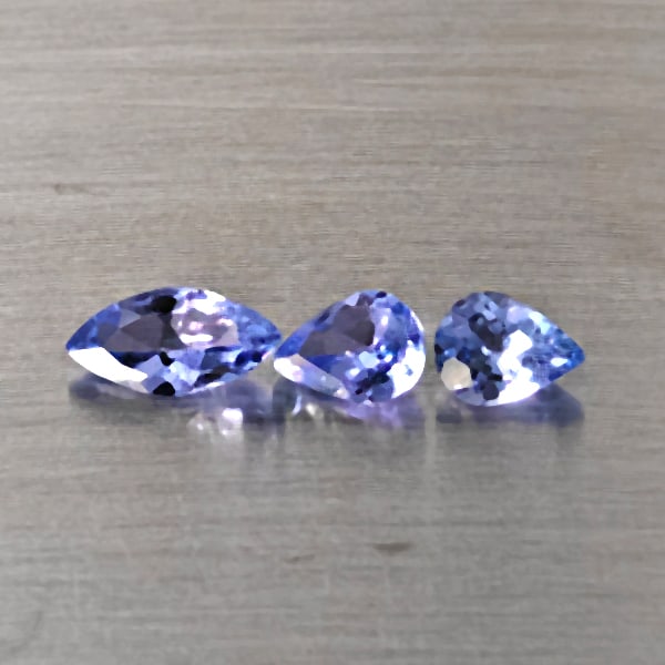 Natural Blue Tanzanite Gemstones 0.55 Ct. 3 Pcs. Mixed Shape and Mixed Size: Product ID: 807015145 Product Name: Natural Tanzanite Weight: 0.55 CT. Size: 6.1 x 6.1 x 1.9 to 4.2 x 3.1 x 2.1 MM. Shape: Mixed Shape Color: Violetish Blue Clarity:VSI Luster: Good Gems Origin: Tanza