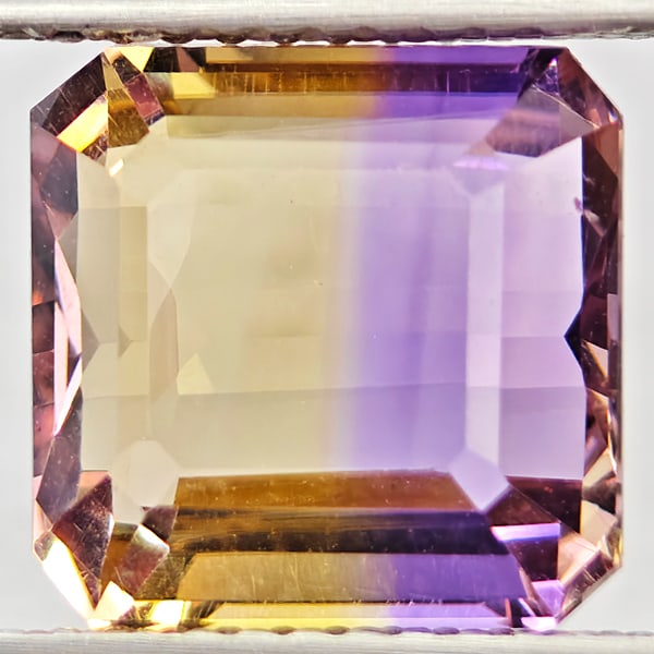 Natural Bi Color Ametrine Gemstones 3.96 Ct. Octagon Shape 9.5 x 9.4 Mm.: Product ID: 800408596 Product Name: Natural Ametrine Weight: 3.96 CT. Size: 9.5 x 9.4 x 5.8 MM. Shape: Octagon Color: Bi Color Clarity:VSI Luster: Good Gems Origin: Bolivia Treatment: Unheated Crystal