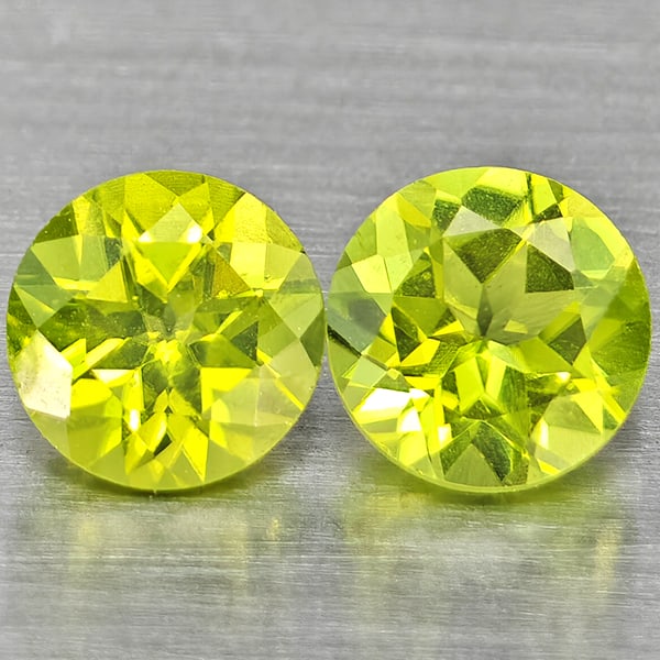 Natural Green Peridot Gemstones 1.21 Ct. 2 Pcs. Round Shape 5.1 Mm.: Product ID: 805317623 Product Name: Natural Peridot Weight: 1.21 CT. Size: 5.1 x 5.1 x 3.3 MM. Shape: Round Color: Green Clarity:VSI Luster: Good Gems Origin: Pakistan Treatment: Unheated Crystal Stru