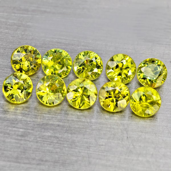 Natural Green Demantiod Garnet Gemstones 1.45 Ct. 10 Pcs. Round Diamond Cut 3.3 Mm.: Product ID: 802937643 Product Name: Natural Demantoid Weight: 1.45 CT. Size: 3.3 x 3.3 x 2.3 to 3.1 x 3.1 x 2.3 MM. Shape: Round Diamond Cut Color: Green Clarity:SI1 Luster: Good Gems Origin: Madagasc