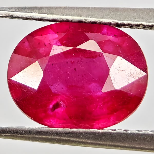 Natural Purplish Red Ruby Gemstones 2.53 Ct. Oval Shape 9.2 x 7.4 Mm.: Product ID: 805935550 Product Name: Natural Ruby Weight: 2.53 CT. Size: 9.2 x 7.4 x 4.4 MM. Shape: Oval Color: Purplish Red Clarity:VSI Luster: Good Gems Origin: Madagascar Treatment: Heated (Lead-gla