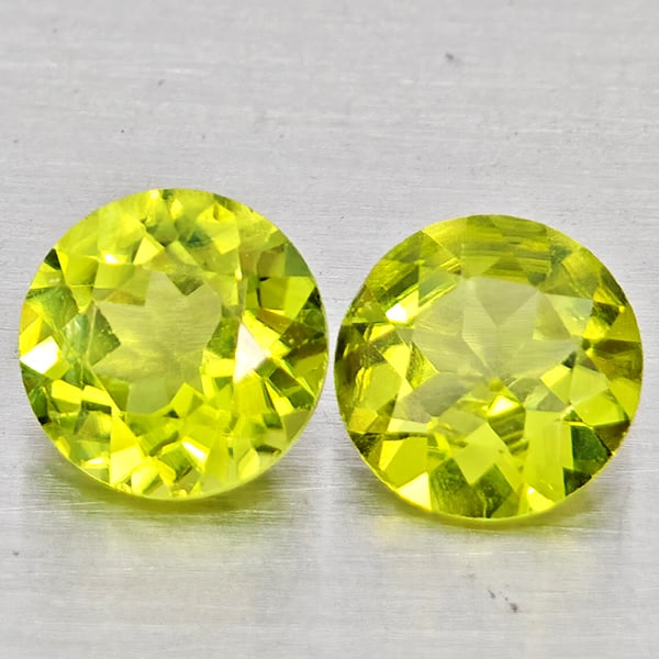 Natural Green Peridot Gemstones 1.62 Ct. 2 Pcs. Round Shape 6 Mm.: Product ID: 805317442 Product Name: Natural Rhodolite Weight: 1.62 CT. Size: 6 x 6 x 3.8 MM. Shape: Round Color: Green Clarity:VSI Luster: Good Gems Origin: Pakistan Treatment: Unheated Crystal Struct