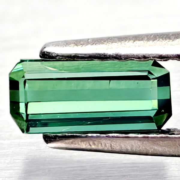 Natural Green Tourmaline Gemstones 0.62 Ct. Octagon Shape 6.7 x 2.8 Mm.: Product ID: 807250912 Product Name: Natural Tourmaline Weight: 0.62 CT. Size: 6.7 x 2.8 x 2.9 MM. Shape: Octagon Color: Green Clarity:VSI Luster: Good Gems Origin: Nigeria Treatment: Unheated Crystal 