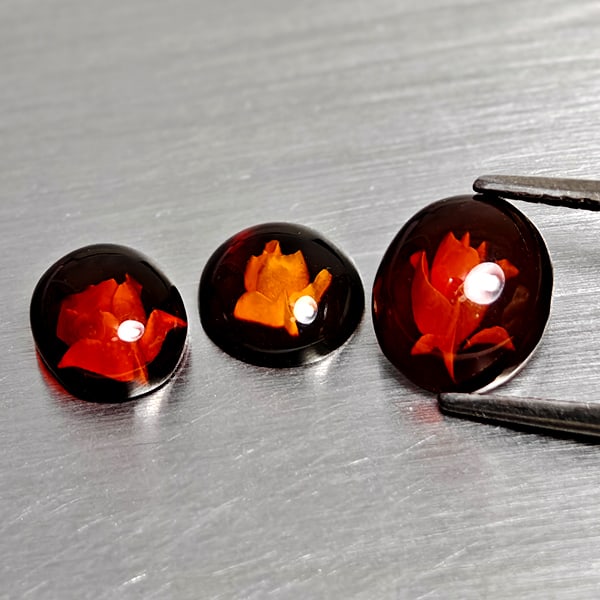 Natural Brown Yellow Amber 1.31 Ct. 3 Pcs. Flower Carving In Oval Cabochon Shape and Mixed Size: Product ID: 819091042 Product Name: Natural Amber Weight: 1.31 CT. Size: 8.4 x 7.2 x 2.8 to 7.3 x 6.2 x 3.3 MM. Shape: Oval Cabochon Color: Brown Yellow Clarity:Semi - Transparent Luster: Good Gems Or