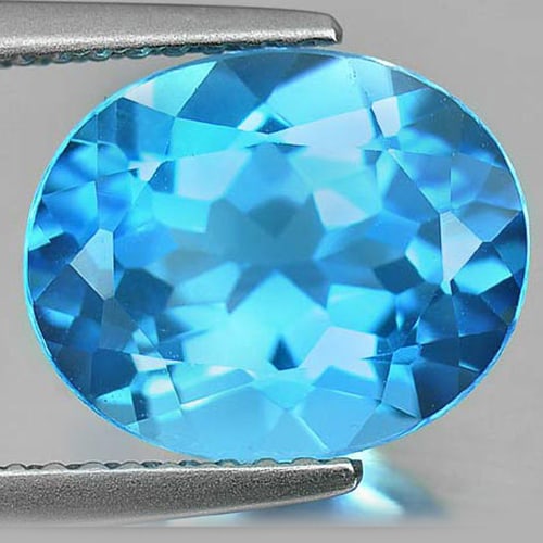 Natural Swiss Blue Topaz Gemstones 4.28 Ct. Oval Shape 11 x 9 Mm.: Product ID: 807160605 Product Name: Natural Blue Topaz Weight: 4.28 CT. Size: 11 x 9 x 5.6 MM. Shape: Oval Color: Swiss Blue Clarity:VVS Luster: Good Gems Origin: Brazil Treatment: Treated Crystal Str