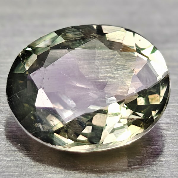 Natural Green Songea Sapphire Gemstones 0.56 Ct. Oval Shape 5.6 x 4.6 Mm.: Product ID: 106116261 Product Name: Natural Green Sapphire Weight: 0.56 CT. Size: 5.6 x 4.6 x 2.5 MM. Shape: Oval Color: Green Clarity:VVS Luster: Good Gems Origin: Tanzania Treatment: Heated Crystal 