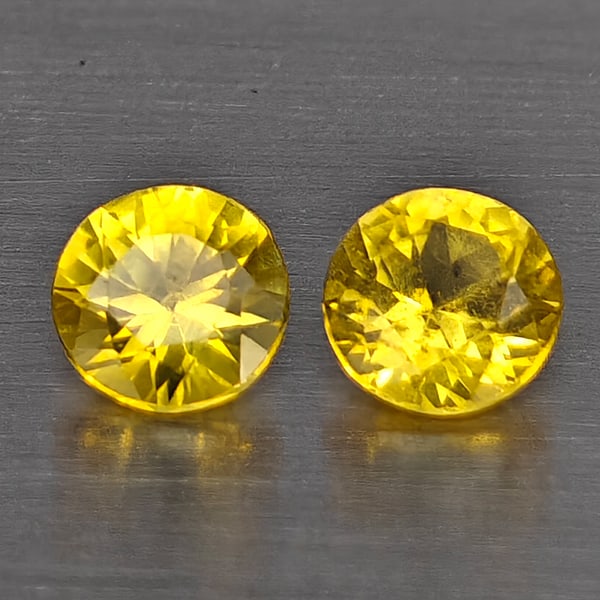 Natural Yellow Songea Sapphire Gemstones 0.35 Ct. 2 Pcs. Round Diamond Cut 3.5 Mm.: Product ID: 806130508 Product Name: Natural Blue Sapphire Weight: 0.35 CT. Size: 3.5 x 3.5 x 2.2 MM. Shape: Round Diamond Cut Color: Yellow Clarity:VSI Luster: Good Gems Origin: Tanzania Treatment: He