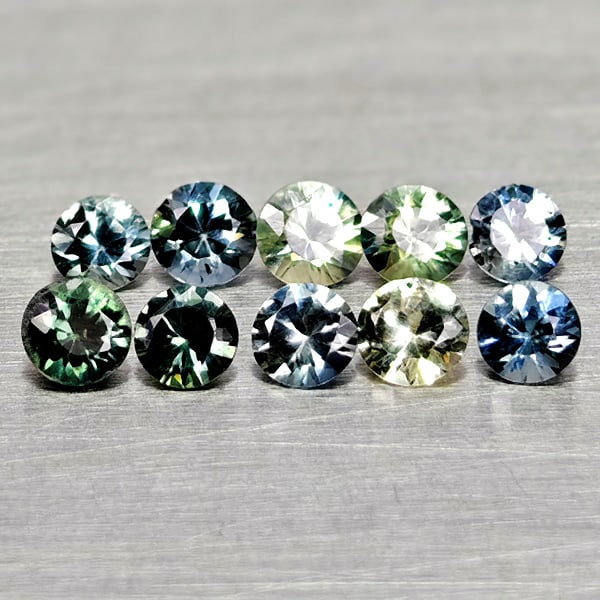Natural Fancy Color Sapphire Gemstones 0.73 Ct. 10 Pcs. Round Diamand Cut 2.6 Mm: Product ID: 806162278 Product Name: Natural Green Sapphire Weight: 0.73 CT. Size: 2.6 x 2.6 x 1.5 MM. Shape: Round Diamond Cut Color: Fancy Color Clarity:VSI Luster: Very Good Gems Origin: Tanzania Tr