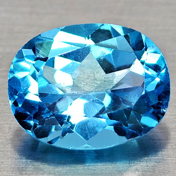 Natural Swiss Blue Topaz Gemstones 2.56 Ct. Oval Shape 9.2 x 7.2 Mm.: Product ID: 807168165 Product Name: Natural Blue Topaz Weight: 2.56 CT. Size: 9.2 x 7.2 x 5 MM. Shape: Oval Shape Color: Swiss Blue Clarity:VVS - VSI Luster: Good Gems Origin: Brazil Treatment: Treate