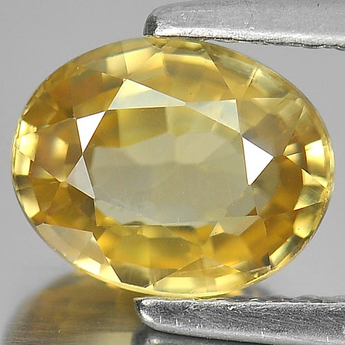Natural Yellow Zircon Gemstones 2.52 Ct. Oval Shape 8.3 x 6.6 Mm.: Product ID: 807729513 Product Name: Natural Zircon Weight: 2.52 CT. Size: 8.3 x 6.6 x 4 MM. Shape: Oval Color: Yellow Clarity:VVS Luster: Very Good Gems Origin: Cambodia Treatment: Heated Crystal Stru