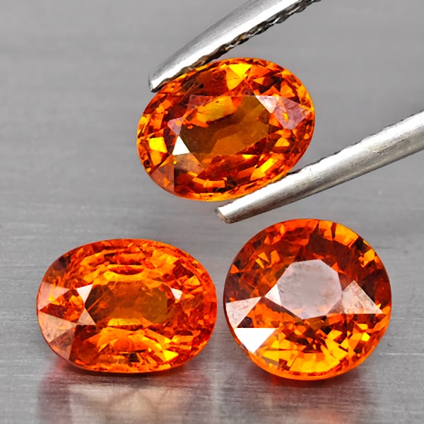 Natural Orangish Red Spessartine Garnet Gemstones 4.04 Ct. 3 Pcs. Mixed Shape: Product ID: 802937935 Product Name: Natural Garnet Weight: 4.04 CT. Size: 7.1 x 5.3 x 3.8 to 6.5 x 6.5 x 4.2 MM. Shape: Mixed Shape Color: Orangish Red Clarity:SI1 Luster: Good Gems Origin: Namibia Tr