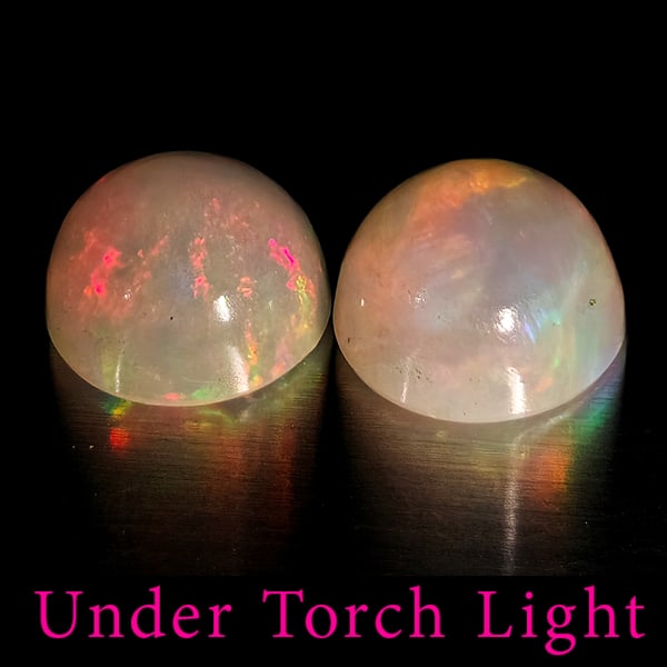 Natural Multi Color Opal Gemstones 2.20 Ct. 2 Pcs. Round Cabochon Shape 7.1 Mm.: Product ID: 818728242 Product Name: Natural Opal Weight: 2.20 CT. Size: 7.1 x 7.1 x 4.5 MM. Shape: Round Color: Multi-Color Clarity:Semi - Transparent Luster: Good Gems Origin: Ethiopia Treatment: Unh