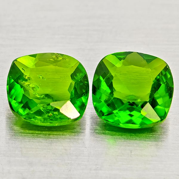 Natural Green Chrome Diopside Gemstones 1.00 Ct. 2 Pcs. Cushion Shape 5.1 Mm.: Product ID: 801608265 Product Name: Natural Chrome Diopside Weight: 1.00 CT. Size: 5.1 x 5.1 x 2.9 MM. Shape: Cushion Shape Color: Green Clarity:SI1 Luster: Good Gems Origin: Russia Treatment: Unheate