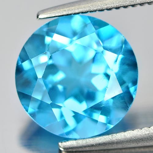 Natural Swiss Blue Topaz Gemstones 3.01 Ct. Round Shape 9 Mm.: Product ID: 807157029 Product Name: Natural Blue Topaz Weight: 3.01 CT. Size: 9 x 9 x 5.4 MM. Shape: Round Color: Swiss Blue Clarity:VSI Luster: Good Gems Origin: Brazil Treatment: Treated Crystal Str