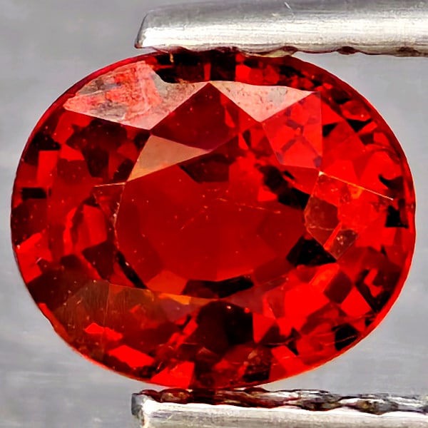 Natural Orangish Red Spessartine Garnet Gemstones 0.84 Ct. Oval Shape 6 x 5 Mm.: Product ID: 802937338 Product Name: Natural Garnet Weight: 0.84 CT. Size: 6 x 5 x 3.2 MM. Shape: Oval Shape Color: Orangish Red Clarity:SI1 Luster: Good Gems Origin: Namibia Treatment: Unheated Crysta