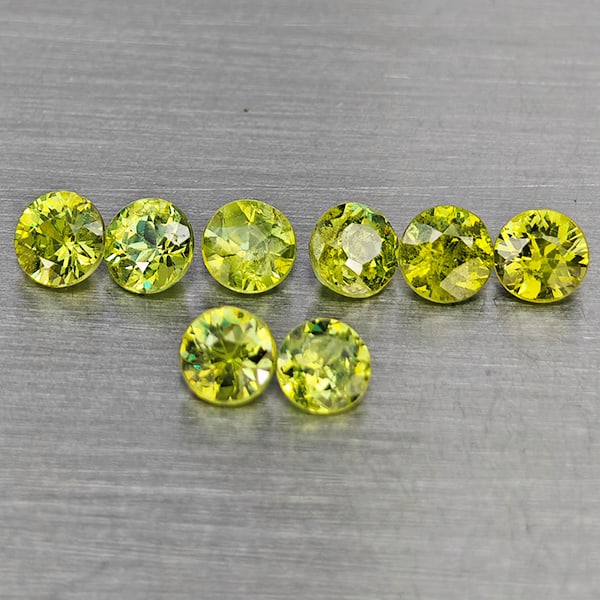 Natural Green Demantiod Garnet Gemstones 1.46 Ct. 8 Pcs. Round Diamond Cut 3.3 Mm.: Product ID: 802937623 Product Name: Natural Demantoid Weight: 1.46 CT. Size: 3.3 x 3.3 x 2.4 MM. Shape: Round Diamond Cut Color: Green Clarity:SI1 Luster: Good Gems Origin: Madagascar Treatment: Unhea