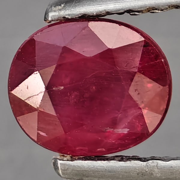 Natural Pinkish Red Ruby Gemstones 1.00 Ct. Oval Shape 6.5 x 5.5 Mm.: Product ID: 805935975 Product Name: Natural Ruby Weight: 1.00 CT. Size: 6.5 x 5.5 x 3.2 MM. Shape: Oval Shape Color: Pinkish Red Clarity:SI1 Luster: Good Gems Origin: Madagascar Treatment: Heated (Lea