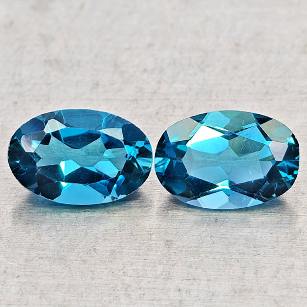 Natural London Blue Topaz Gemstones 0.95 Ct. 2 Pcs.Oval Shape 6 x 4 Mm.: Product ID: 807168470 Product Name: Natural Blue Topaz Weight: 0.95 CT. Size: 6 x 4 x 2.5 MM. Shape: Oval Shape Color: London Blue Clarity:VSI - SI1 Luster: Good Gems Origin: Brazil Treatment: Treated