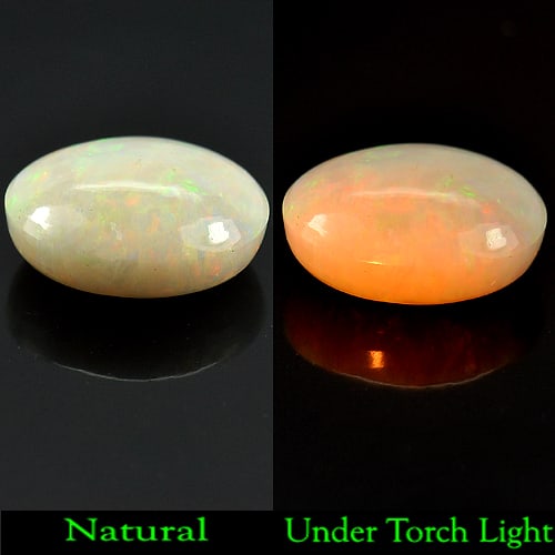 Natural Multi-Color Opal Gemstones 4.66 Ct. Oval Cabochon Shape 13.7 x 10 Mm.: Product ID: 818723802 Product Name: Natural Opal Weight: 4.66 CT. Size: 13.7 x 10 x 6.5 MM. Shape: Oval Cabochon Color: Multi Color Clarity:Opaque Luster: Strong Iridescent Gems Origin: Ethiopia Treat