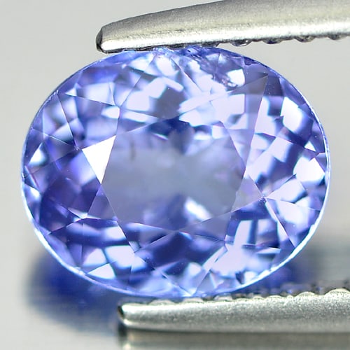 Natural Blue Tanzanite Gemstones 1.81 Ct. Oval Shape 8.15 x 6.74 Mm.: Product ID: 807006138 Product Name: Natural Tanzanite Weight: 1.81 CT. Size: 8.15 x 6.74 x 4.56 MM. Shape: Oval Color: Blue Clarity:VSI Luster: Good Gems Origin: Tanzania Treatment: Heated Crystal Str