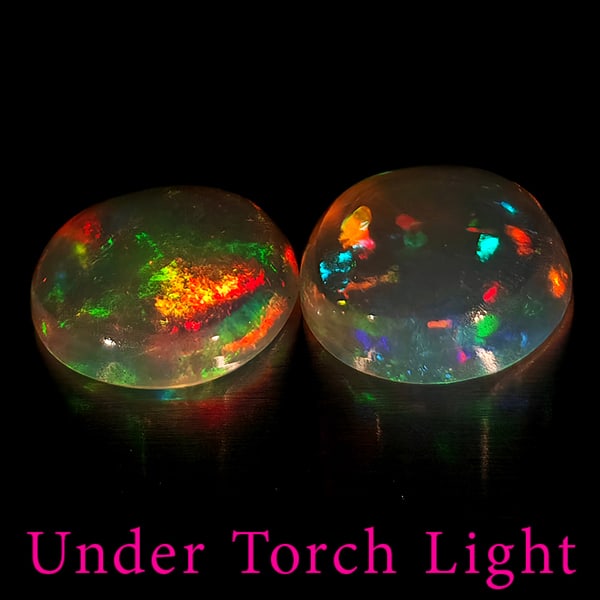 Natural Multi Color Opal Gemstones 1.39 Ct. 2 Pcs. Round Cabochon Shape 7.1 Mm.: Product ID: 818728155 Product Name: Natural Opal Weight: 1.39 CT. Size: 7.1 x 7.1 x 2.4 MM. Shape: Round Cabochon Color: Multi-Color Clarity:Semi - Transparent Luster: Good Gems Origin: Ethiopia Treat