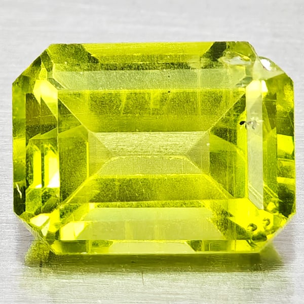 Natural Green Peridot Gemstones 1.83 Ct. Octagon Shape 8.2 x 6.2 Mm.: Product ID: 805317186 Product Name: Natural Peridot Weight: 1.83 CT. Size: 8.2 x 6.2 x 4.2 MM. Shape: Octagon Shape Color: Green Clarity:SI1 Luster: Good Gems Origin: Pakistan Treatment: Unheated Crys