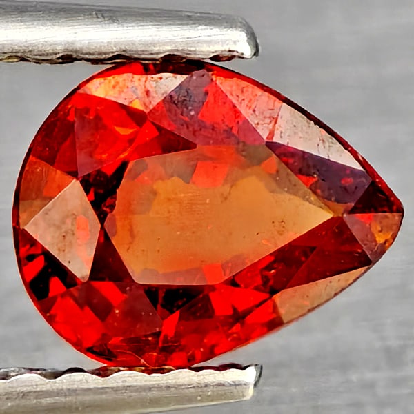 Natural Orangish Red Spessartine Garnet Gemstones 0.82 Ct. Pear Shape 6.5 x 5.2 Mm.: Product ID: 802937341 Product Name: Natural Garnet Weight: 0.82 CT. Size: 6.5 x 5.2 x 3 MM. Shape: Pear Shape Color: Orangish Red Clarity:SI1 Luster: Good Gems Origin: Namibia Treatment: Unheated Crys