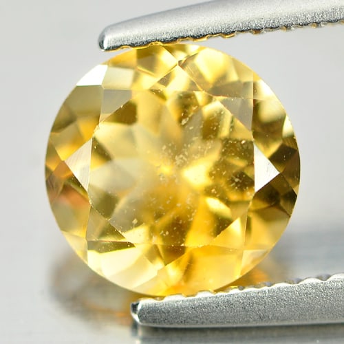 Natural Yellow Citrine Gemstones 1.24 Ct. Round Shape 7.2 Mm.: Product ID: 801811521 Product Name: Natural Citrine Weight: 1.24 CT. Size: 7.2 x 7.2 x 4.5 MM. Shape: Round Color: Yellow Clarity:VSI Luster: Good Gems Origin: Brazil Treatment: Unheated Crystal Struc