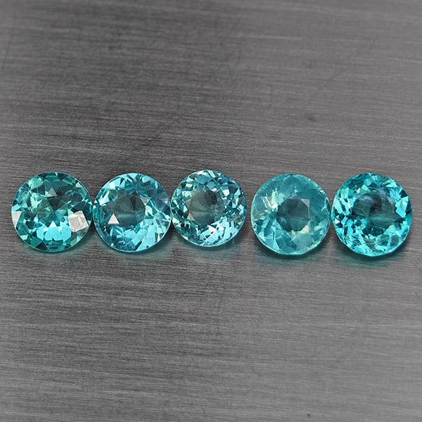 Natural Paraiba Color Apatite Gemstones 2.50 Ct. 5 Pcs. Round Shape 5.1 Mm.: Product ID: 800613738 Product Name: Natural Apatite Weight: 2.50 CT. Size: 5.1 x 5.1 x 2.7 MM. Shape: Round Color: Paraiba Color Clarity:SI1 Luster: Good Gems Origin: Tanzania Treatment: Unheated Crys