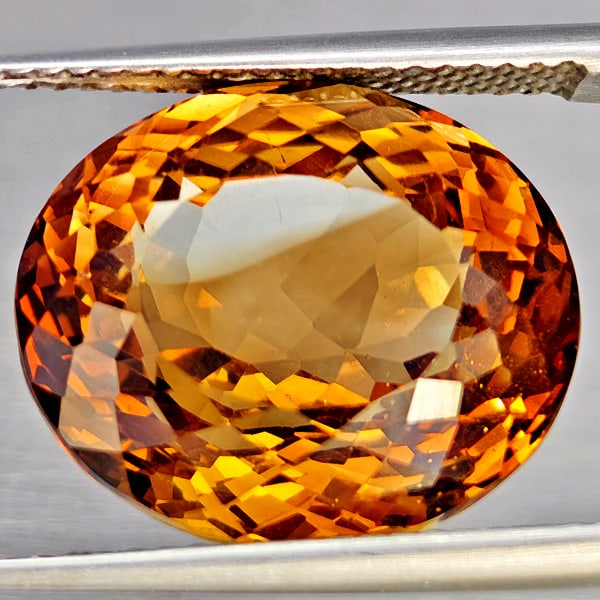 Natural Imperial Topaz Gemstones 16.15 Ct. Oval Shape 15.7 x 13.5 Mm.: Product ID: 807168607 Product Name: Natural Topaz Weight: 16.15 CT. Size: 15.7 x 13.5 x 9.8 MM. Shape: Oval Shape Color: Imperial Clarity:VSI Luster: Good Gems Origin: Brazil Treatment: Treated Crysta