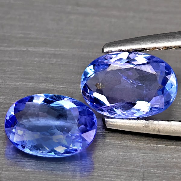 Natural Blue Tanzanite Gemstones 1.65 Ct. 2 Pcs. Oval Shape 7.5 x 5.2 Mm.: Product ID: 807007121 Product Name: Natural Tanzanite Weight: 1.65 CT. Size: 7.5 x 5.2 x 2.9 MM. Shape: Oval Color: Violetish Blue Clarity:SI Luster: Good Gems Origin: Tanzania Treatment: Heated Cryst