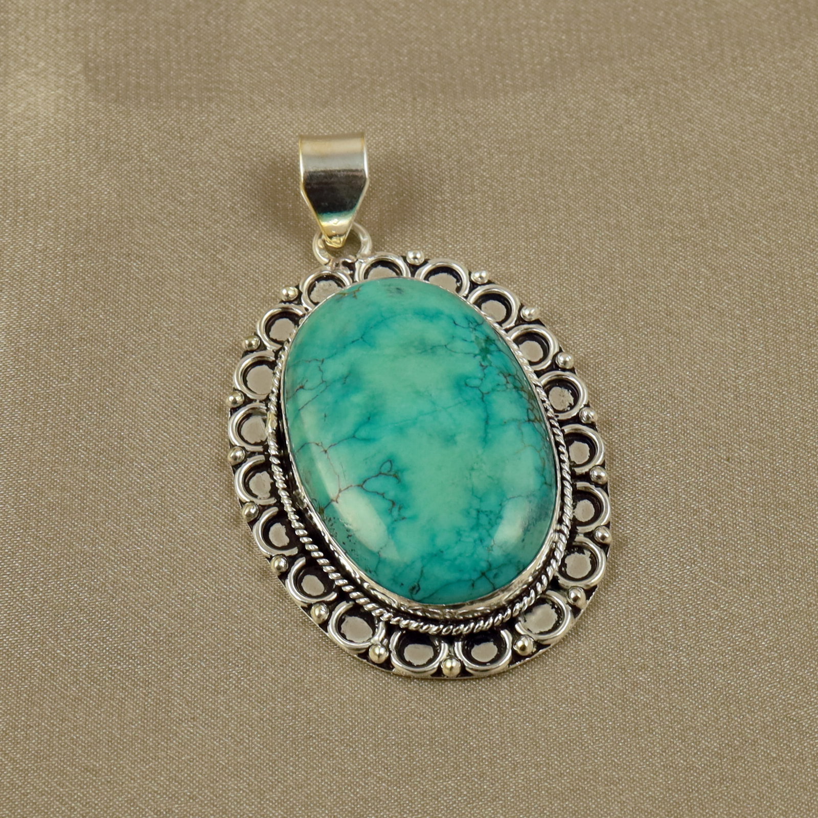 Natural Turquoise Sterling Silver Plated Handmade Pendant: Product ID: 260518134543 Product - Handmade Silver Plated Pendant Metal - 92.5 Sterling Silver Plated Pendant Size - 4.5x3CM Gemstone - Turquoise Gemstone Origin - Tibet Gemstone Shape - Oval Pendant 