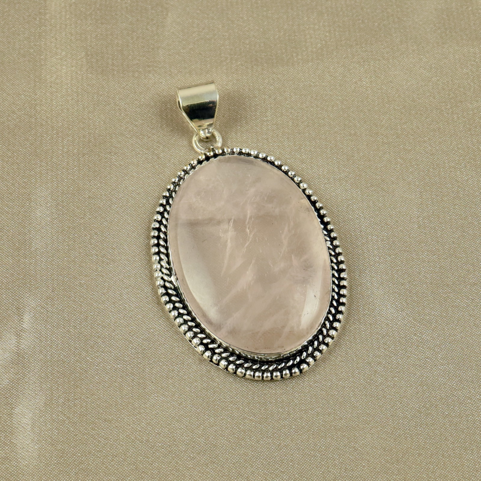 Natural Rose Quartz Sterling Silver Plated Handmade Pendant: Product ID: 260518132449 Product - Handmade Silver Plated Pendant Metal - 92.5 Sterling Silver Plated Pendant Size - 4.5x3CM Gemstone - Rose Quartz Gemstone Origin - Brazil Gemstone Shape - Oval Penda