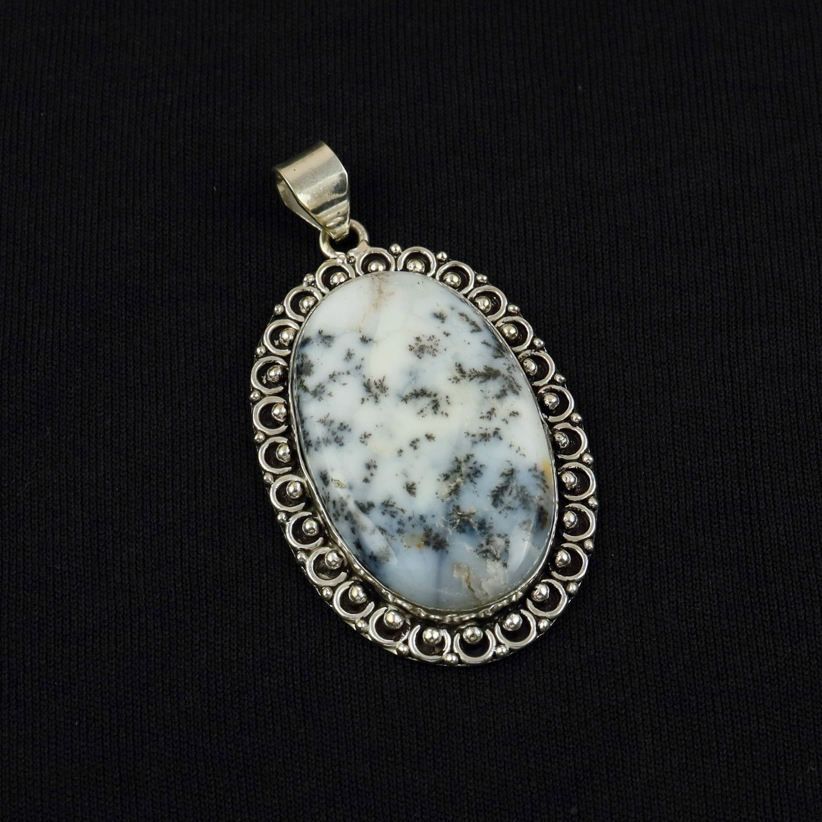 Natural Dendrite Opal Sterling Silver Plated Handmade Pendant: Product ID: 260513104954 Product - Handmade Silver Plated Pendant Metal - 92.5 Sterling Silver Plated Pendant Size - 5x3.5 CM Gemstone - Dendrite Opal Gemstone Origin - Madagascar Gemstone Shape - Ova