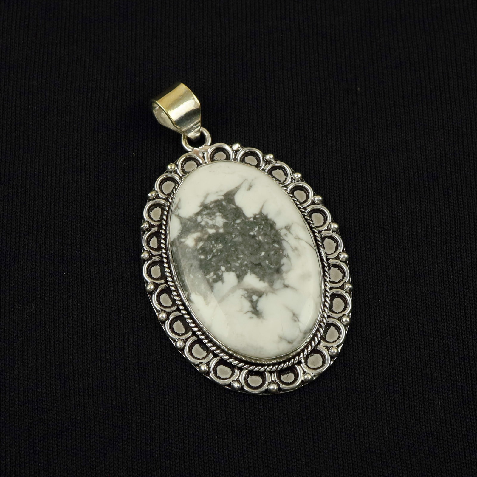 Natural Howlite Sterling Silver Plated Handmade Pendant: Product ID: 260513105230 Product - Handmade Silver Plated Pendant Metal - 92.5 Sterling Silver Plated Pendant Size - 5x3.5 CM Gemstone - Howlite Gemstone Origin - Canada Gemstone Shape - Oval Pendant 